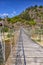 Wooden rope suspension bridge for walk