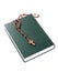 Wooden rosary on the Bible