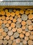 Wooden round shaped timber under a canopy.