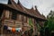 Wooden rural house with an unusual roof in the village of the Minangkabau people on the island of Sumatra