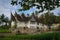 Wooden rural house with an unusual roof in the village of the Minangkabau people on the island of Sumatra