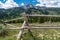 Wooden rustic fence in front of the Teton mountain range in Grand Teton National Park