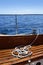 Wooden sailboat boat deck blue sky ocean sea