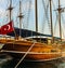 wooden sailboat cruise ship near the pier Turkish coast