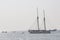 Wooden sailboat (dhow) on the clear turquoise water of Zanzibar