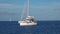 Wooden sailboat, white catamarans, yachts and runabouts in Mediterranean sea