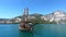 Wooden sailing ship on the turquoise water of the Green Canyon