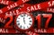 Wooden sale 2017 background with clock.