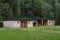 Wooden sanitary group in a campsite at the edge of the forest, near Savinja river. Slovenia, Europe