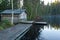 Wooden sauna house on autumn lake coast