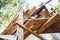 Wooden scaffolding, rural house facade