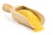 Wooden scoop with corn flour