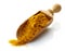 Wooden scoop with curry powder