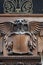 Wooden sculpture of a figure or character with wings. Old and historic architectural detailing. Travel and tourism in Budapest,