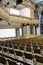 Wooden seats in an empty theater hall