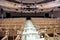 Wooden seats in an empty theater hall