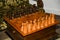 Wooden set of retro chess in the form of a curbstone