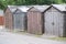 Wooden shed huts for storage in row with lock for owner security