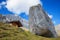 Wooden shelter and big rock, swiss alps