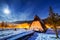 Wooden shelter in Tatra mountains at night