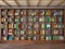 Wooden shelves in the room with different books.