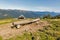 Wooden shepherd lodge with Alpine mountain landscape in Austria.