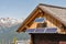 Wooden shepherd lodge with Alpine mountain landscape in Austria.