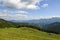 Wooden shepherds house on green meadow Traditional rural landscape in mountains. Carpathians