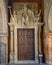 Wooden side door in the Puerta de Perdon or Door of Forgiveness, the visitors entrance to the Seville Cathedral on Alemanes Street