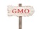 Wooden sign with abbreviation GMO on white background