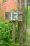 Wooden sign giving garden plot number