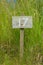 Wooden sign giving garden plot number