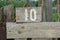 Wooden sign giving garden plot number