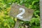 Wooden sign giving garden plot number