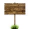 Wooden sign in green grass