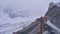 Wooden sign marking the hiking trail over glacier \\\