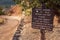 Wooden sign at Queens Garden trail in Bryce Canyon