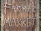 Wooden sign Wood stick type font Farmer market Signage on wooden wall