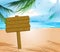 Wooden signboard on idealistic tropical beach