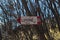 Wooden signpost for hikers near Limone at Lake Garda, Italy