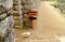 Wooden signpost pointing to the THREE DOORWAYS in the archaeological site of Machu Picchu, Cusco Region, Peru