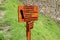 Wooden signpost to the INKA BRIDGE, GUARDHOUSE, SUN GATE and WAYNAPICCHU MOUNTAIN in the archaeological site of Machu Picchu