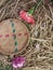 Wooden silver bamboo and quail eggs on thatch background
