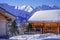 Wooden Ski Chalet In Snow. Beautiful view of French Alps full of snow winter.