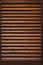 Wooden slatted fence or lath front showcase cabinet or wardrobe, frame door and drawers made from dark wood, background and