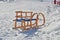 Wooden sleds on snow