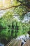 wooden small raft floating on canal