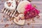 Wooden Soap Holder with a Heart shaped Goat milk Soap, Natural loofah sponge and dried roses on wood