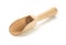 Wooden spice scoop on white background