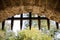 Wooden spikes gate of a sliding door portcullis at the entrance of a medieval fortress